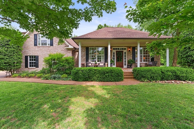 102 Lorelle Cir, Portland, TN 37148 - single story home featuring covered porch, a front yard, and brick siding