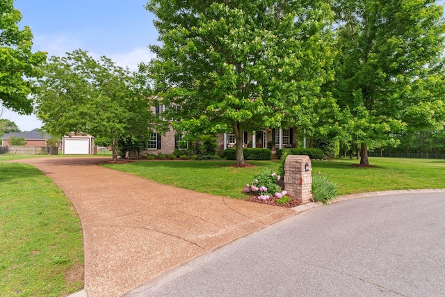 102 Lorelle Cir, Portland, TN 37148 - obstructed view of property with concrete driveway