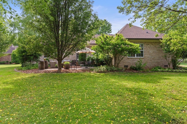 102 Lorelle Cir, Portland, TN 37148 - view of grassy yard with a patio area