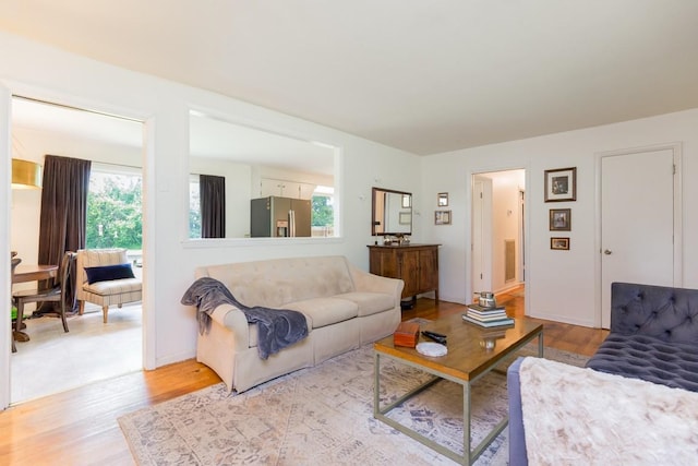 1006 Kirkwood Ave, Murfreesboro, TN 37130 - living area featuring wood finished floors and plenty of natural light
