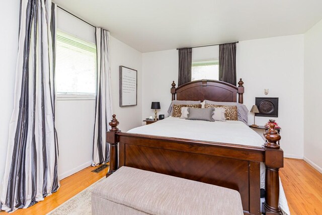 1006 Kirkwood Ave, Murfreesboro, TN 37130 - bedroom featuring light wood-type flooring and baseboards