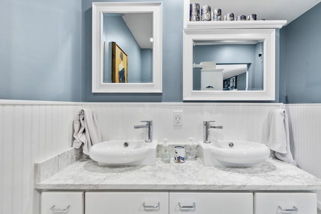 1205 Parker Dr, Pulaski, TN 38478 - full bath with a wainscoted wall and double vanity