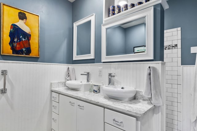 1205 Parker Dr, Pulaski, TN 38478 - full bathroom featuring wainscoting and double vanity