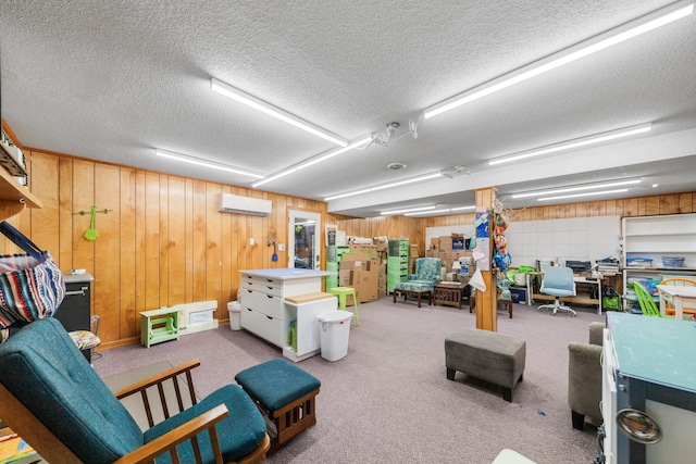 1205 Parker Dr, Pulaski, TN 38478 - finished below grade area featuring a textured ceiling, a wall mounted air conditioner, wooden walls, a desk, and carpet