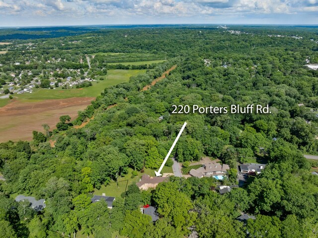 220 Porters Bluff Rd, Clarksville, TN 37040 - aerial view of property and surrounding area with a heavily wooded area