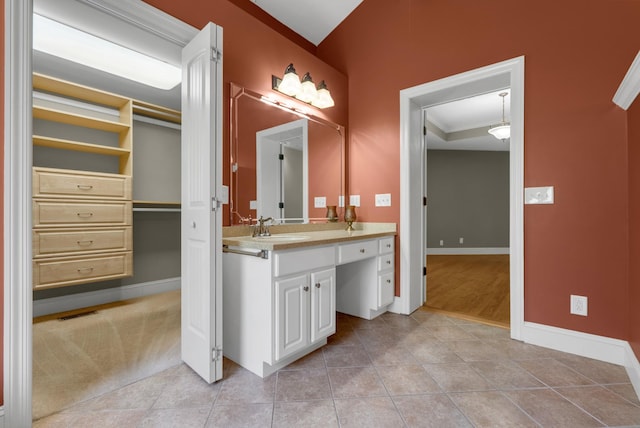220 Porters Bluff Rd, Clarksville, TN 37040 - bathroom featuring baseboards, tile patterned flooring, and vanity