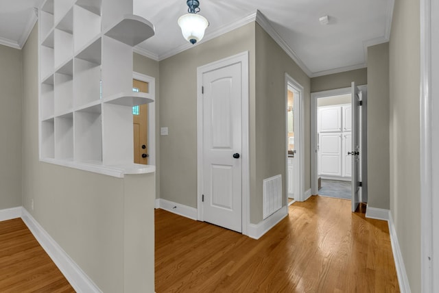 220 Porters Bluff Rd, Clarksville, TN 37040 - corridor featuring light wood-type flooring, baseboards, and ornamental molding