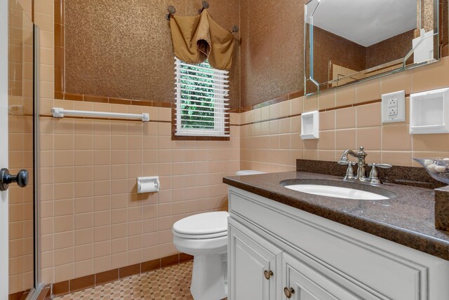 220 Porters Bluff Rd, Clarksville, TN 37040 - full bath with tile walls, a shower stall, toilet, and vanity