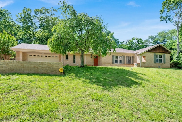 220 Porters Bluff Rd, Clarksville, TN 37040 - single story home with brick siding, an attached garage, and a front lawn