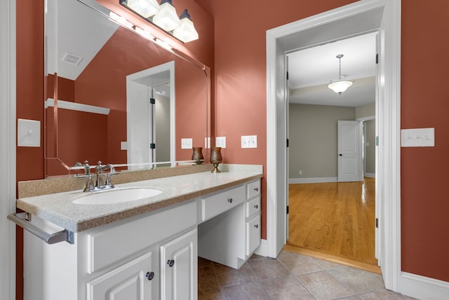 220 Porters Bluff Rd, Clarksville, TN 37040 - bathroom with vanity, tile patterned floors, and baseboards