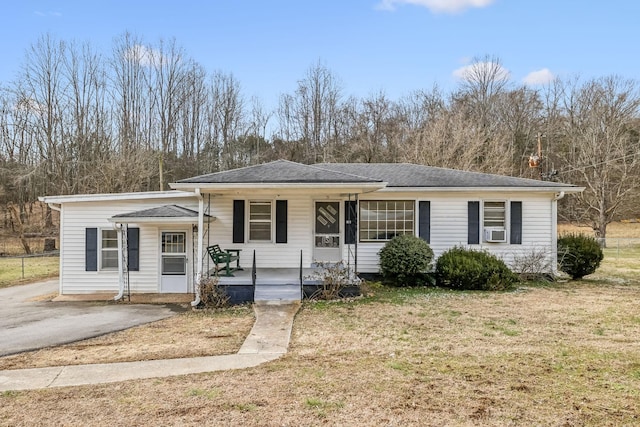 25 Lock Seven Ln, Carthage, TN 37030 - view of front of property featuring covered porch, a front lawn, cooling unit, and a shingled roof