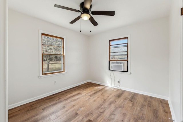 25 Lock Seven Ln, Carthage, TN 37030 - spare room featuring light wood-type flooring, baseboards, ceiling fan, and cooling unit