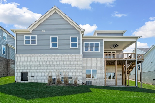 129 Barlow Dr, Franklin, TN 37064 - back of property with a ceiling fan, a yard, stairs, brick siding, and central AC unit