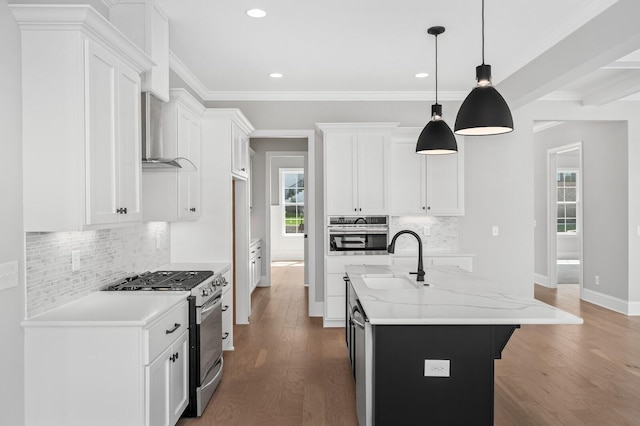129 Barlow Dr, Franklin, TN 37064 - kitchen featuring appliances with stainless steel finishes, a sink, wood finished floors, tasteful backsplash, and recessed lighting