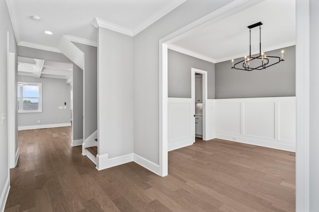 129 Barlow Dr, Franklin, TN 37064 - unfurnished dining area with crown molding, wood finished floors, a chandelier, and baseboards