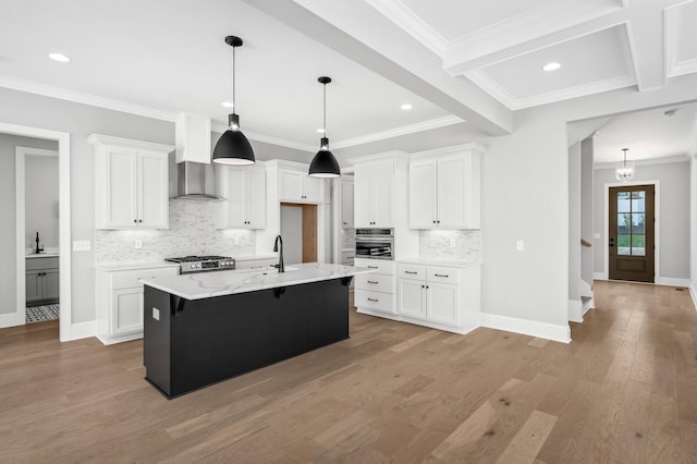 129 Barlow Dr, Franklin, TN 37064 - kitchen with appliances with stainless steel finishes, light wood-style flooring, white cabinetry, backsplash, and baseboards