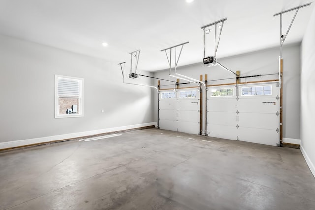 129 Barlow Dr, Franklin, TN 37064 - garage with a garage door opener and baseboards