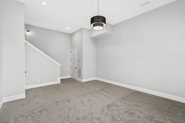 129 Barlow Dr, Franklin, TN 37064 - spare room featuring carpet, baseboards, stairway, and recessed lighting