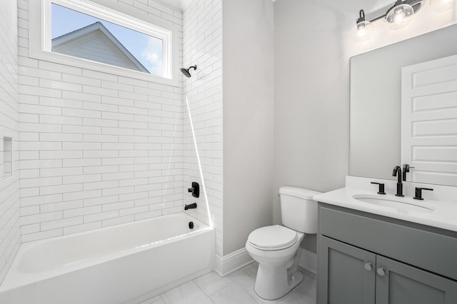 129 Barlow Dr, Franklin, TN 37064 - bathroom with toilet, baseboards, marble look tile flooring, bathing tub / shower combination, and vanity