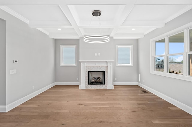 129 Barlow Dr, Franklin, TN 37064 - unfurnished living room with beamed ceiling, coffered ceiling, baseboards, light wood-style floors, and a fireplace
