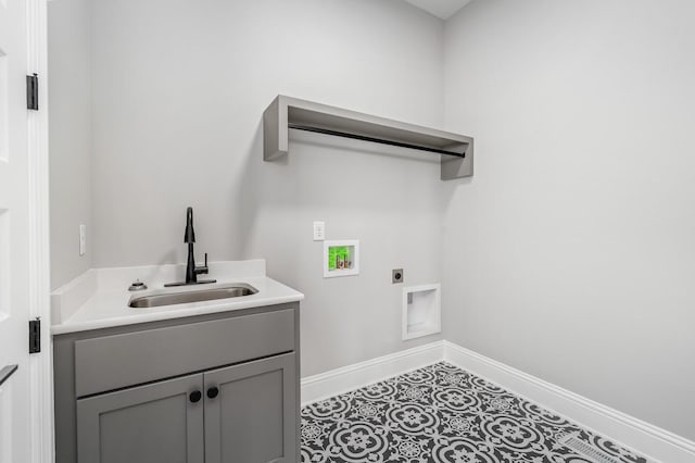 129 Barlow Dr, Franklin, TN 37064 - clothes washing area with hookup for an electric dryer, hookup for a washing machine, baseboards, and cabinet space