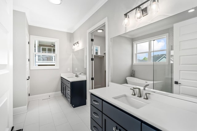 129 Barlow Dr, Franklin, TN 37064 - bathroom featuring a freestanding bath, two vanities, baseboards, tile patterned floors, and ornamental molding