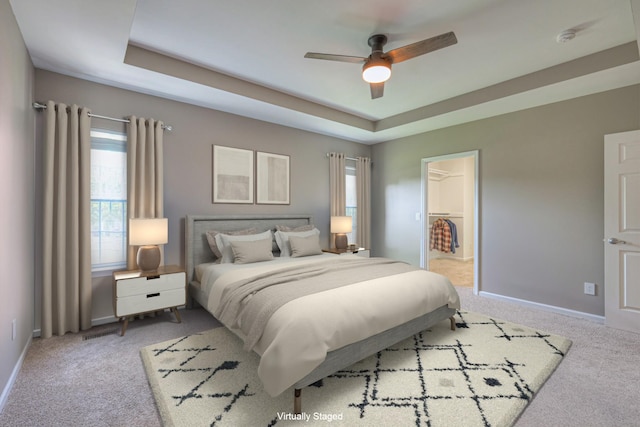 4002 Lattigo Ct, Spring Hill, TN 37174 - bedroom with carpet floors, baseboards, a tray ceiling, and a ceiling fan
