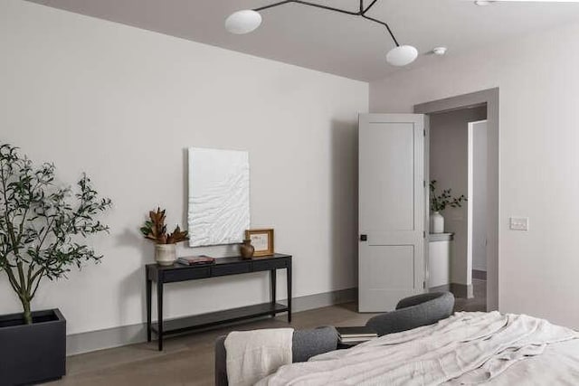 bedroom featuring baseboards