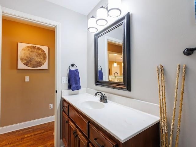 302 Janie St, Smyrna, TN 37167 - bathroom with wood finished floors, vanity, and baseboards