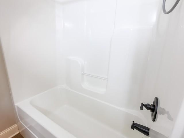302 Janie St, Smyrna, TN 37167 - full bath with baseboards and bathtub / shower combination