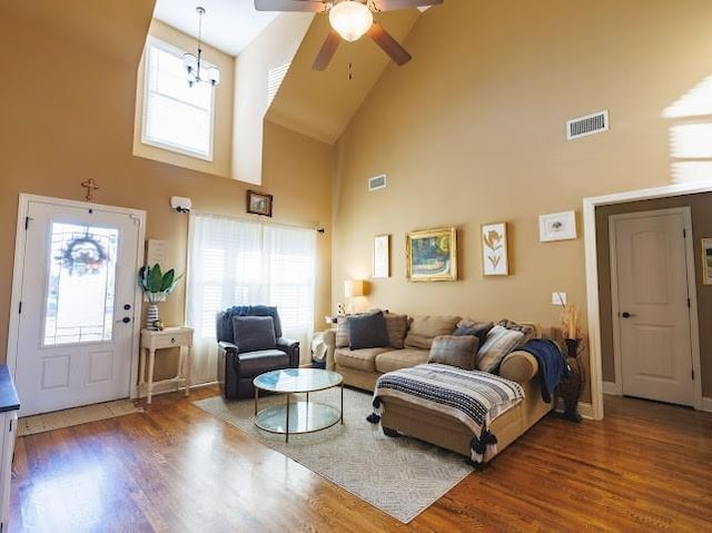302 Janie St, Smyrna, TN 37167 - living area featuring high vaulted ceiling, wood finished floors, ceiling fan, and healthy amount of natural light