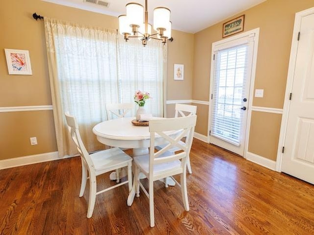 302 Janie St, Smyrna, TN 37167 - dining space featuring a chandelier, wood finished floors, and baseboards