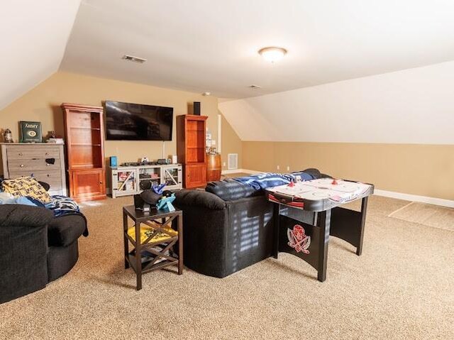 302 Janie St, Smyrna, TN 37167 - living room with carpet and lofted ceiling