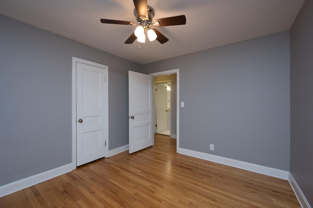 3310 Glencliff Rd, Nashville, TN 37211 - unfurnished bedroom featuring baseboards, light wood-style flooring, and a ceiling fan