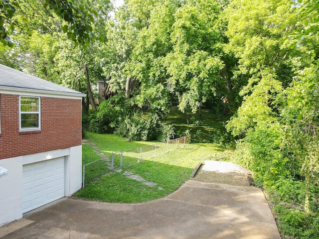 3310 Glencliff Rd, Nashville, TN 37211 - view of yard with a garage and driveway