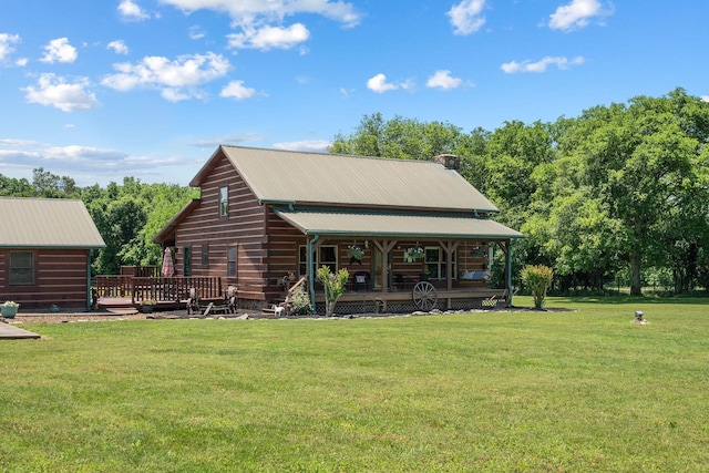 10120 Lascassas Pike, Lascassas, TN 37085 - back of house featuring a porch, a lawn, and metal roof