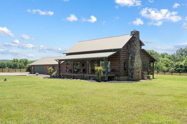 10120 Lascassas Pike, Lascassas, TN 37085 - back of house featuring a chimney, metal roof, and covered porch
