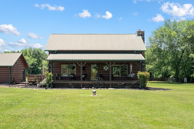 10120 Lascassas Pike, Lascassas, TN 37085 - back of house featuring a yard, a chimney, metal roof, and a porch