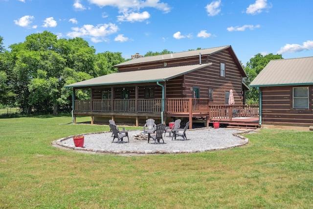 10120 Lascassas Pike, Lascassas, TN 37085 - back of house with a fire pit, a wooden deck, a patio, a yard, and metal roof