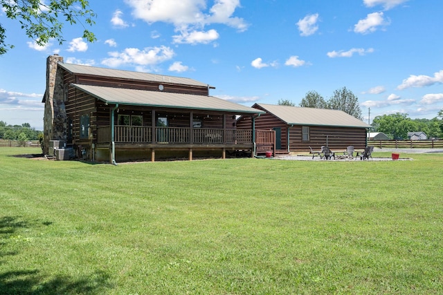 10120 Lascassas Pike, Lascassas, TN 37085 - back of property featuring a yard, central air condition unit, a chimney, and metal roof