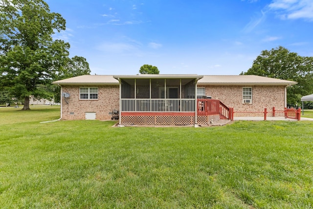 111 Hickory Trce, Lyles, TN 37098 - rear view of house with a sunroom, a lawn, brick siding, and crawl space