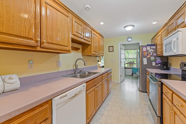 111 Hickory Trce, Lyles, TN 37098 - kitchen with white appliances, a sink, light countertops, baseboards, and light tile patterned floors