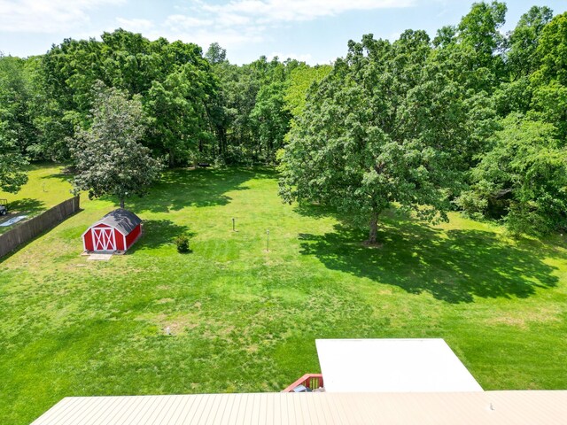 111 Hickory Trce, Lyles, TN 37098 - view of yard featuring a shed and an outbuilding