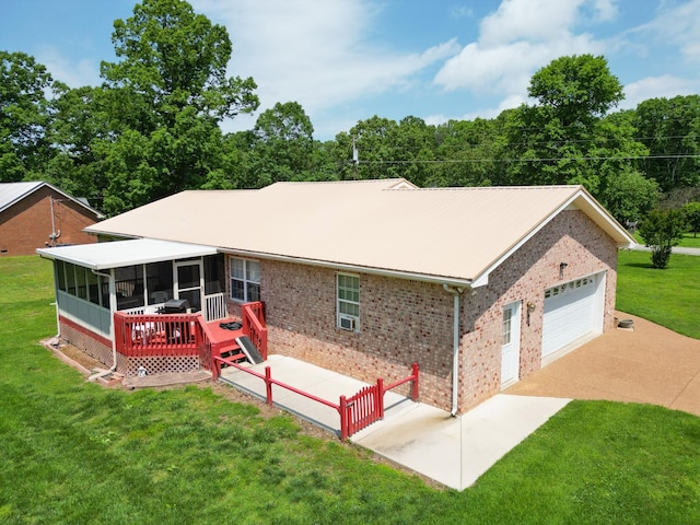 111 Hickory Trce, Lyles, TN 37098 - ranch-style home with brick siding, a sunroom, and a front lawn