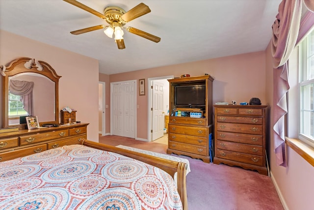 111 Hickory Trce, Lyles, TN 37098 - bedroom featuring light carpet, multiple windows, baseboards, and a ceiling fan