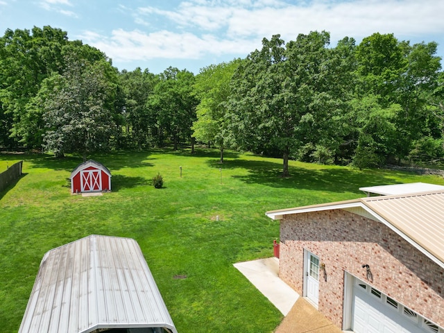 111 Hickory Trce, Lyles, TN 37098 - view of green lawn with a shed and an outdoor structure