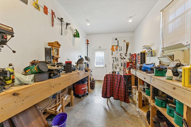 111 Hickory Trce, Lyles, TN 37098 - miscellaneous room with a workshop area and finished concrete floors