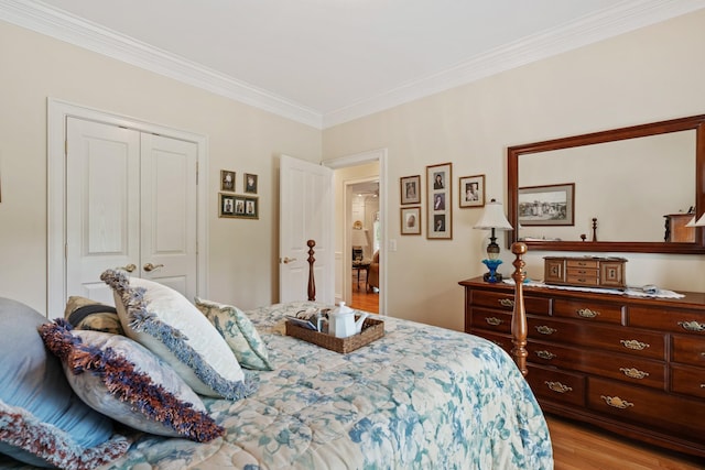 2039 Sparta Pike, Lebanon, TN 37090 - bedroom featuring crown molding, a closet, and light wood-style flooring