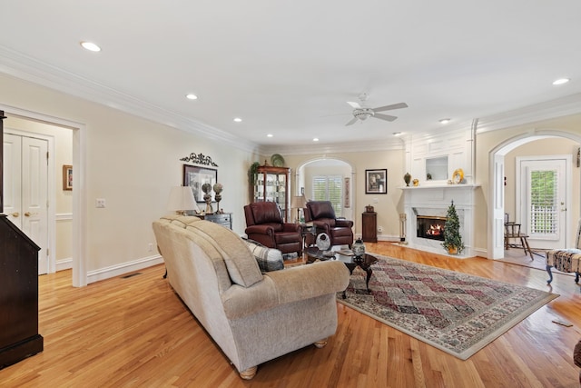 2039 Sparta Pike, Lebanon, TN 37090 - living room featuring arched walkways, plenty of natural light, ceiling fan, crown molding, and recessed lighting