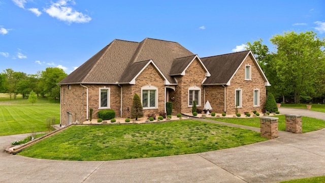 2039 Sparta Pike, Lebanon, TN 37090 - traditional home with brick siding, a front lawn, and a shingled roof